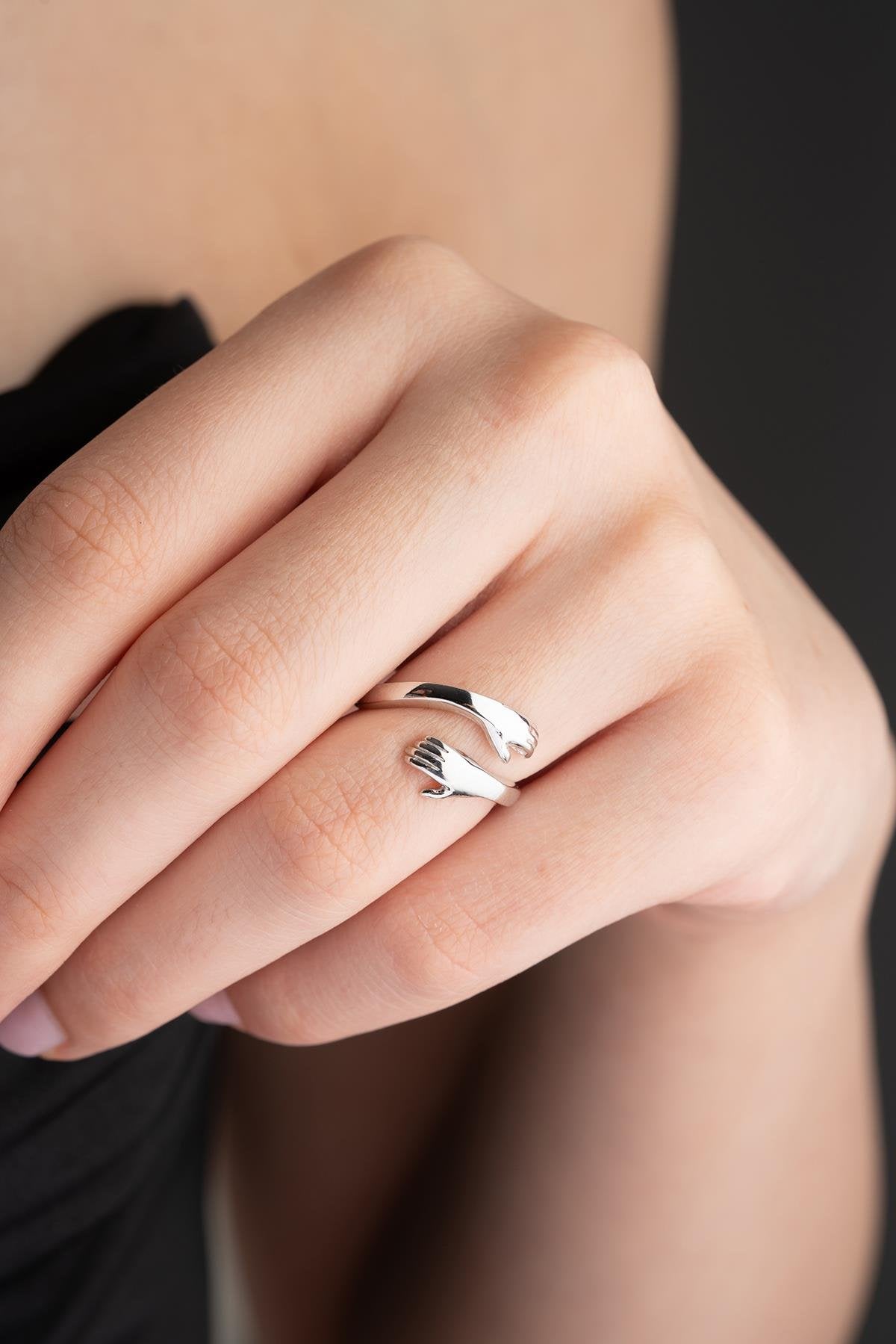 Rhodium Plated Hugging Hands