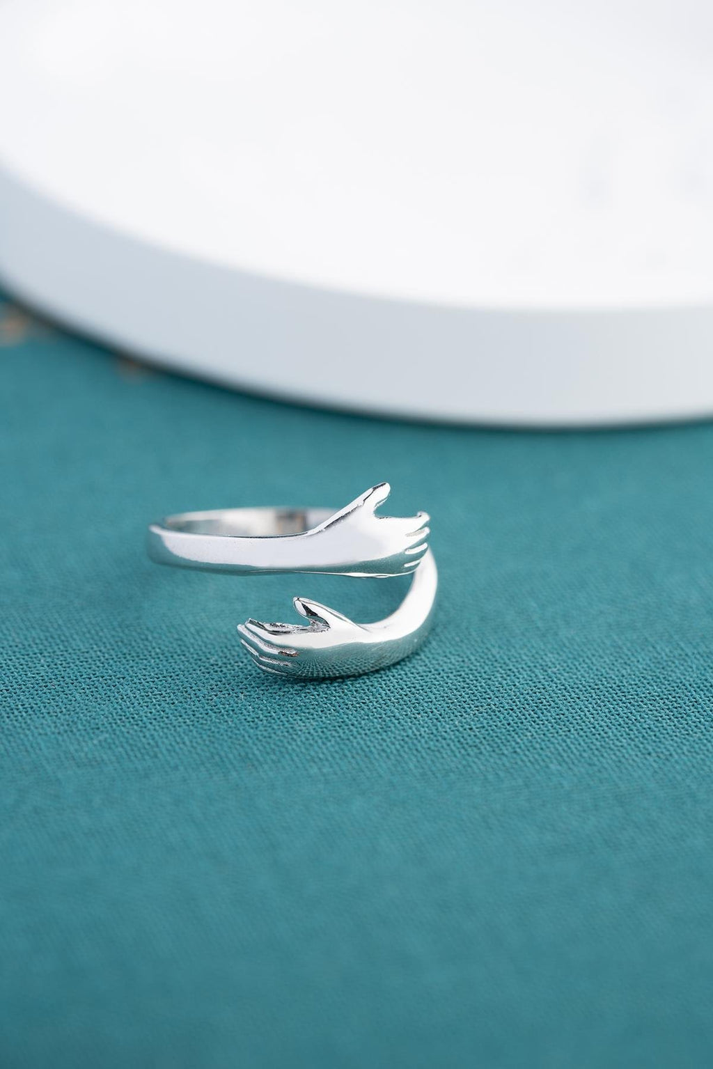 Rhodium Plated Hugging Hands