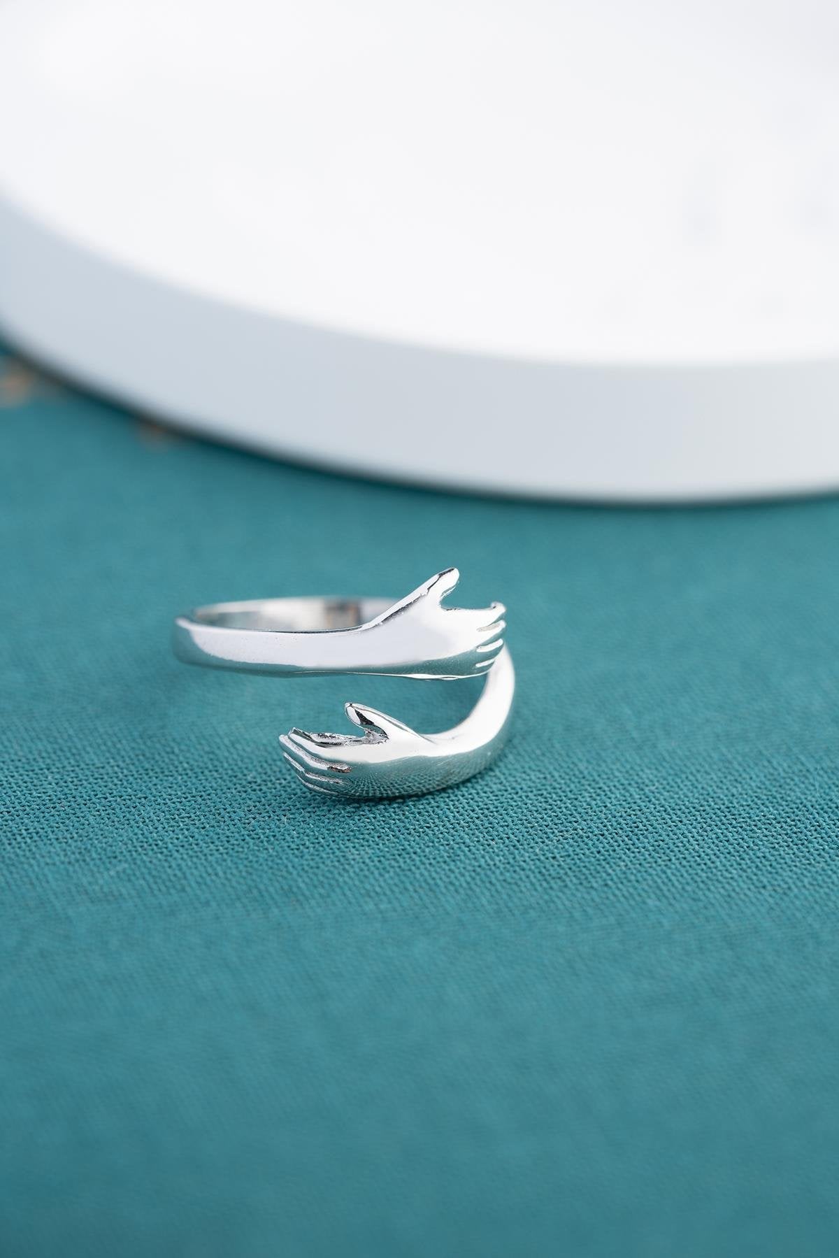 Rhodium Plated Hugging Hands