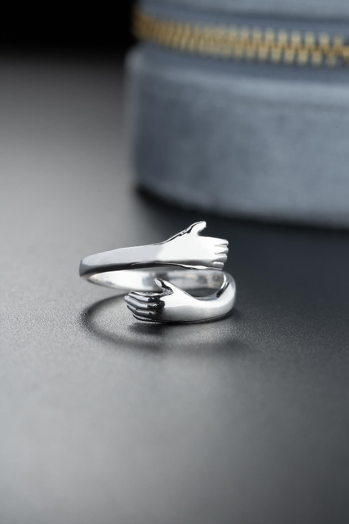 Rhodium Plated Hugging Hands